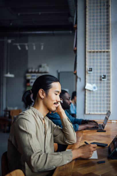 istock People Working in a Cozy Cafe with Laptops and Tablets 2164260756