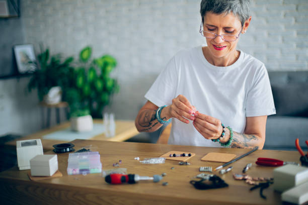 istock Women making handmade jewelry at  art studio 2164262682