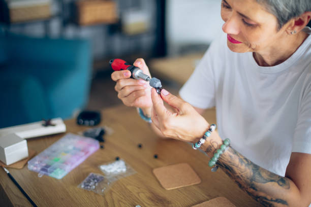 istock Women making handmade jewelry at  art studio 2164262713