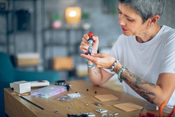 istock Women making handmade jewelry at  art studio 2164262785