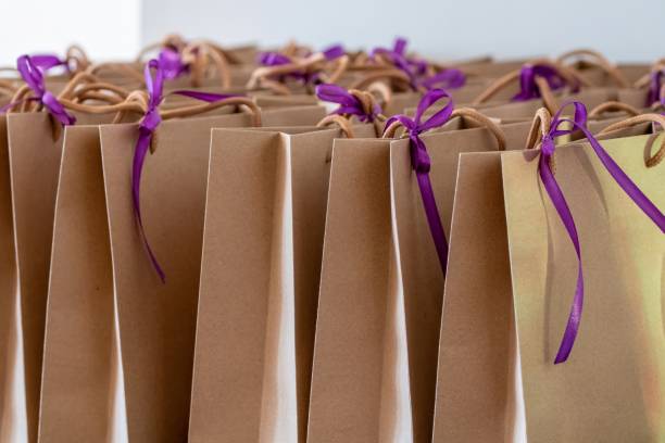 Brown Gift Bags with Purple Ribbons