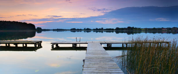 istock Lake with Wooden Pier at Sunset 2164267640