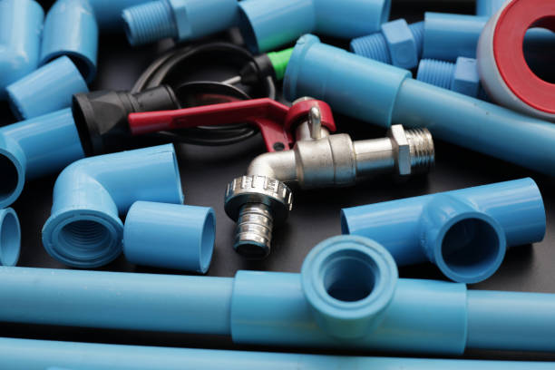 istock Plumber equipment with blue pvc pipe connections for plumbing work. 2164267754