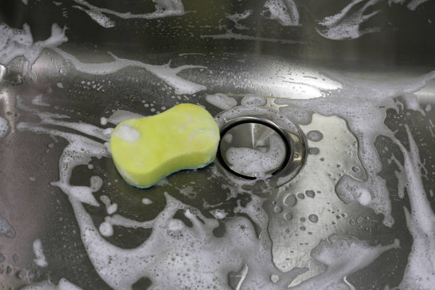 istock Cleaning the kitchen sink concept 2164269274