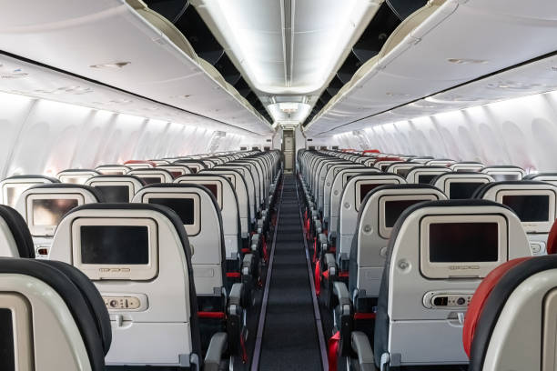 istock Perspective view of empty aircraft seats and lights. 2164271015