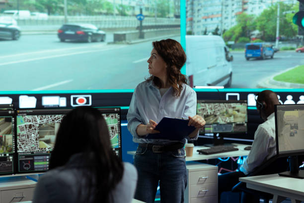 istock Young manager reviewing traffic surveillance data with her staff team 2164276352