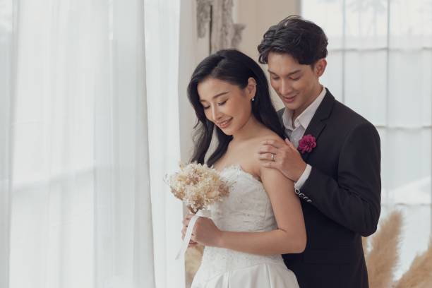 Romantic Bride and Groom Embracing on Their Wedding Day