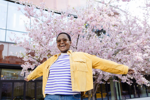 istock Young Woman Embracing Springtime 2164276949