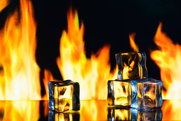 istock studio photo of a burning ice crystal and in a black reflective surface 2164278420