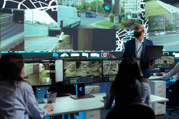 istock Middle eastern manager instructing staff to help couriers on guiding in traffic 2164278891