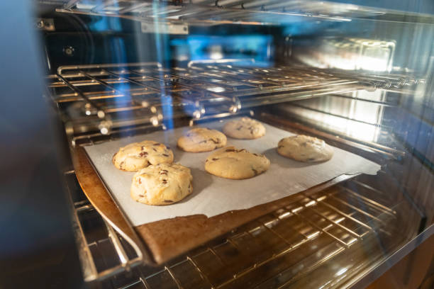 istock Homemade Chocolate chips cookies baking in the oven 2164279315