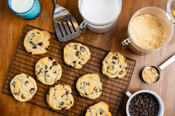 Fresh baked Chocolate Chip Cookies on cooling rack, flat lay, background.