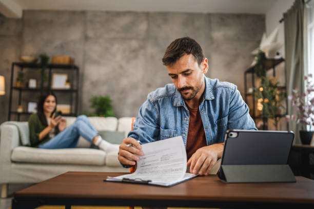 istock Adult man work from home check information form clipboard 2164279935