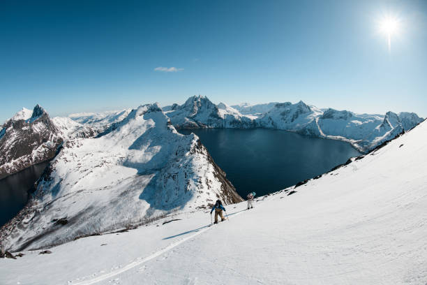istock High-angle view of a mountain range with a river flowing by 2164281720