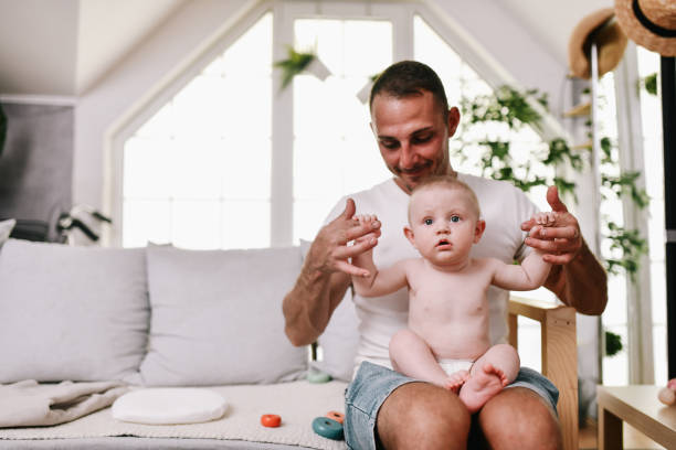 istock Play Time For Father And Baby Son 2164283423