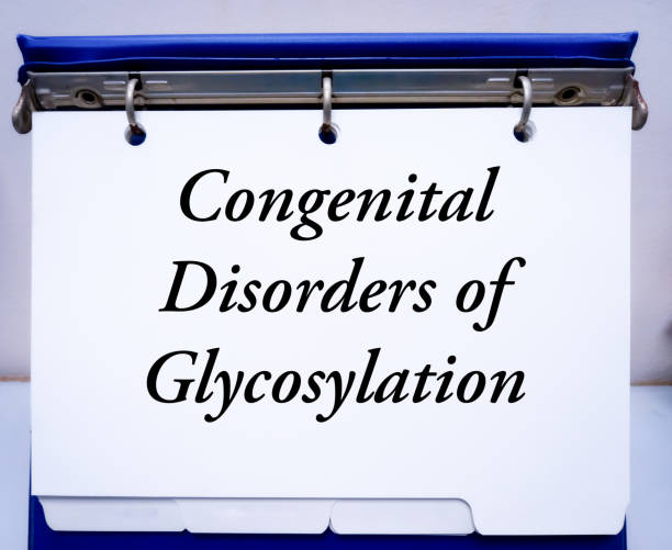 Congenital Disorders of Glycosylation (CDG), a large group of rare genetic disorders that affect the addition of sugar building blocks, called glycans to proteins in cells throughout the body. trastornos congénitos de la glicosilación (cdg, por sus siglas en inglés), un gran grupo de trastornos genéticos raros que afectan la adición de bloques de construcción de azúcar, llamados glicanos, a las proteínas en las células de todo el cuerpo