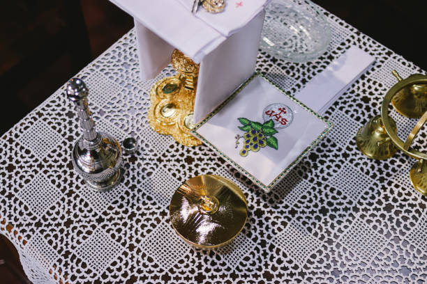 istock Wedding table with silver and gold candlesticks and candles.Holy communion. Catholic theme. 2164285935