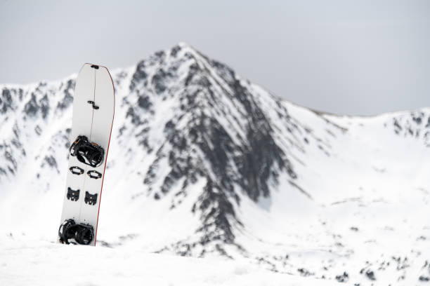 istock Focus on a white splitboard, on a blurred background of a beautiful mountain landscape 2164286818