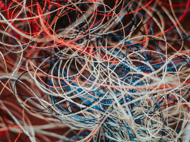 Chaotically tangled threads. Embroidery threads randomly woven. Huge knot. Extreme macro. Beautiful story for intro. Title credits. Abstract screensaver. Handicraft concept, entropy, disorder measure