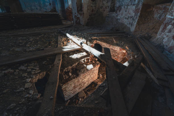 istock Ruins inside an abandoned church with collapsed floor 2164292876