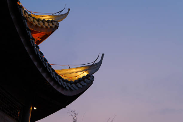 istock Lighted Chinese traditional roof corner 2164298464