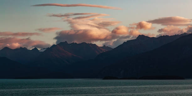 Dramatic Sunrise over Alaska Coast. Nature Background.