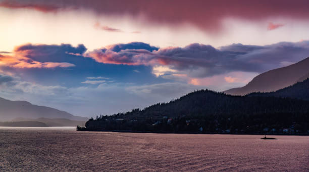 istock Dramatic Stormy Cloudy Morning over Alaska Coast 2164300222