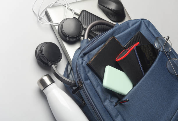 istock Laptop with Modern gadgets and accessories for work and study in Backpack on white background. 2164305087
