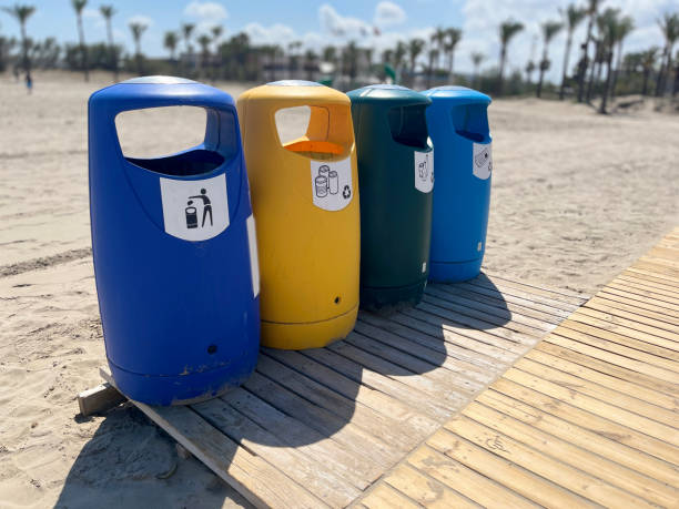 istock Multi-coloured recycle bins at Spanish beach 2164307064