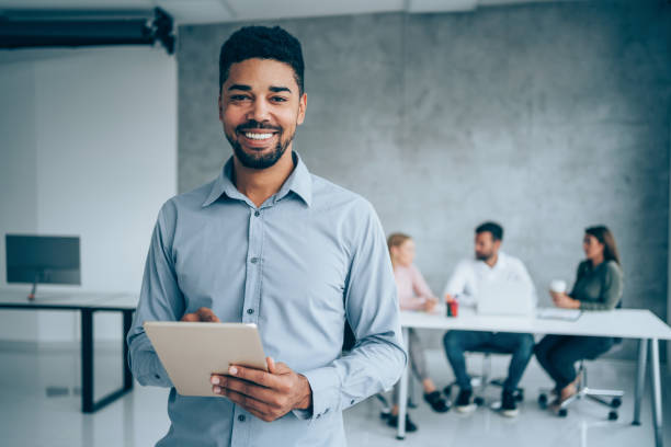 istock Successful businessman in the office. 2164312147