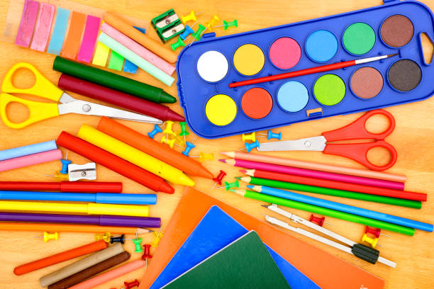 istock High angle view of school supplies 2164312557