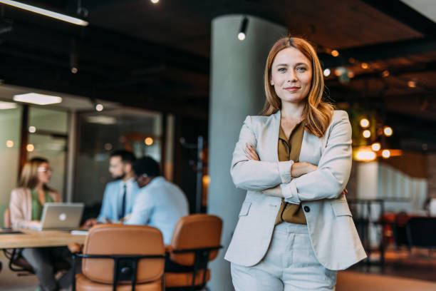istock Confident businesswoman and her team. 2164312861