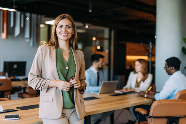 istock Confident businesswoman and her team. 2164312866