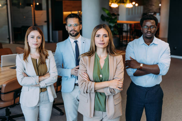 istock Confident businesswoman and her team. 2164312884