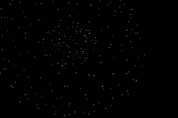 Fireworks are spreading across the sky.