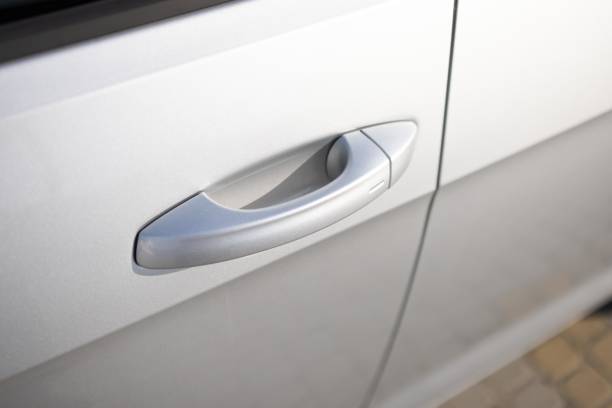istock Keyless entry car door handle with keyless go touch sensor. Car door handle. Access button. Automatic opening of a car door without a key. Exterior design of a new electric luxury car 2164315230