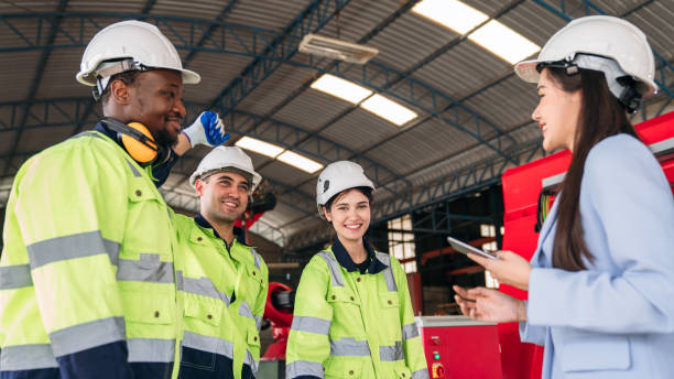 istock A group of construction workers wearing safety gear 2164315836