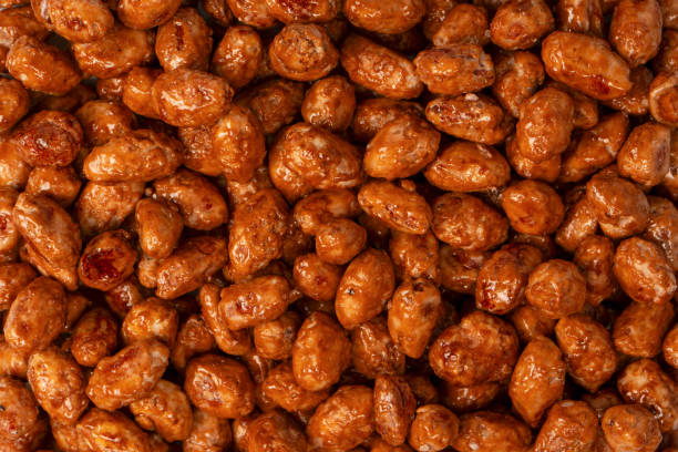 istock Tasty sweet roasted peanuts as a background. 2164316060