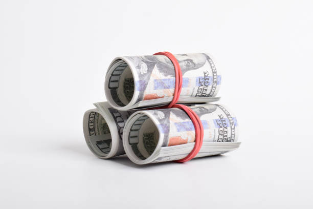 istock Dollar roll wrapped with red rubber. 100 dollar 2164316956