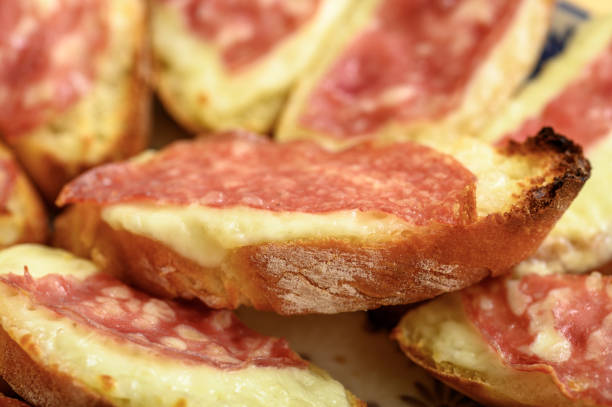 istock Bruschetta with mozzarella and salami 2164317251