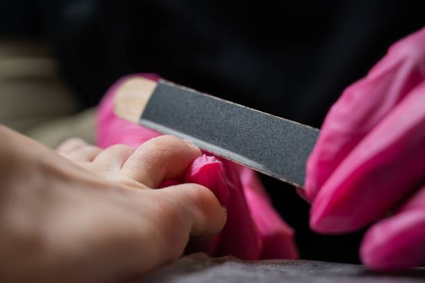 istock The master makes hardware pedicures to the client. 2164317690