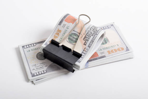 istock Dollars with metal clip. Banknotes, U.S. dollars 2164317733
