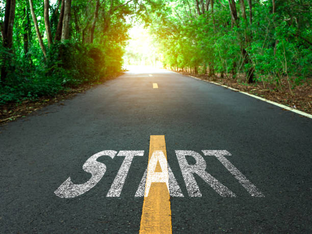 istock Starting line on asphalt road, Business startup idea, Copy space background, Path to success, Business competition concept, Setting business goals. 2164317903