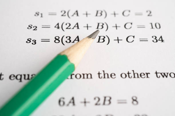 istock Pencil on mathematic formula exercise test paper in education school. 2164319194