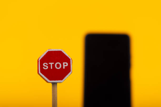 STOP Sign Toy with Blurred Phone