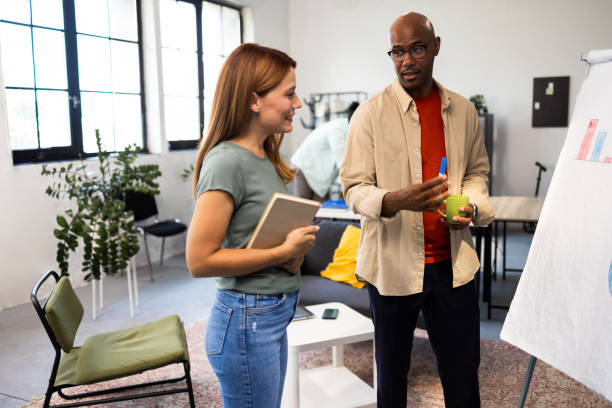 istock Two colleagues from the business team working on some new ideas 2164328411