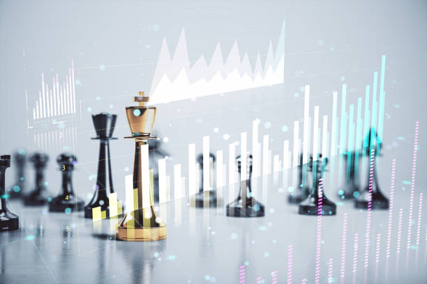 istock Chess king and pieces with digital financial graphs on blurred background. 2164330648