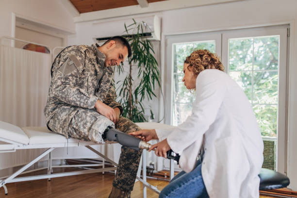 istock Soldier's prosthetic leg being adjusted by a doctor 2164331757