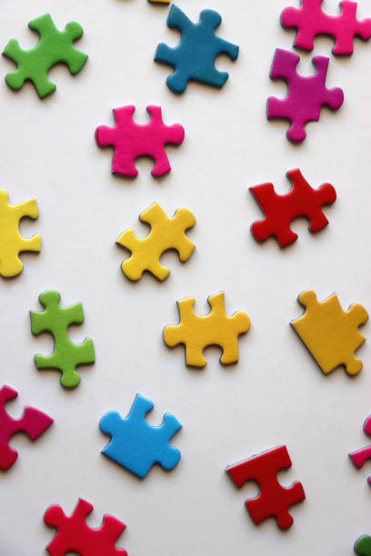 istock Colorful Jigsaw Puzzle Pieces 2164331759