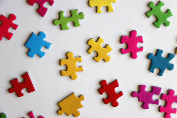 istock Colorful Jigsaw Puzzle Pieces 2164331774